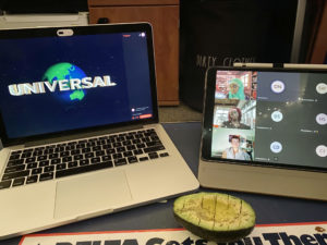 laptop, iPad, and half an avacado on a desk
